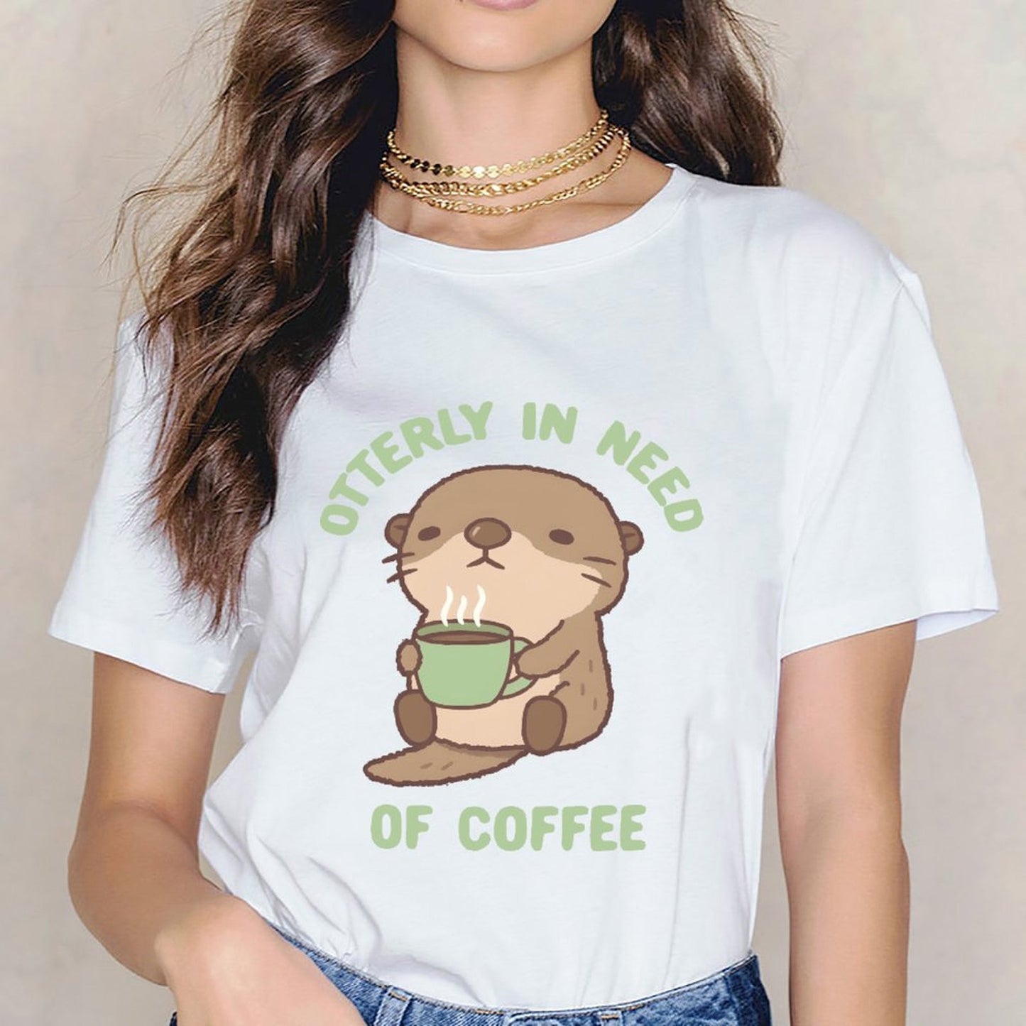 Inkmay Casual Cotton T-shirt Cute Otter Holding Green Coffee Cup Unisex T-shirtMade-to-Order Essential T-Shirt