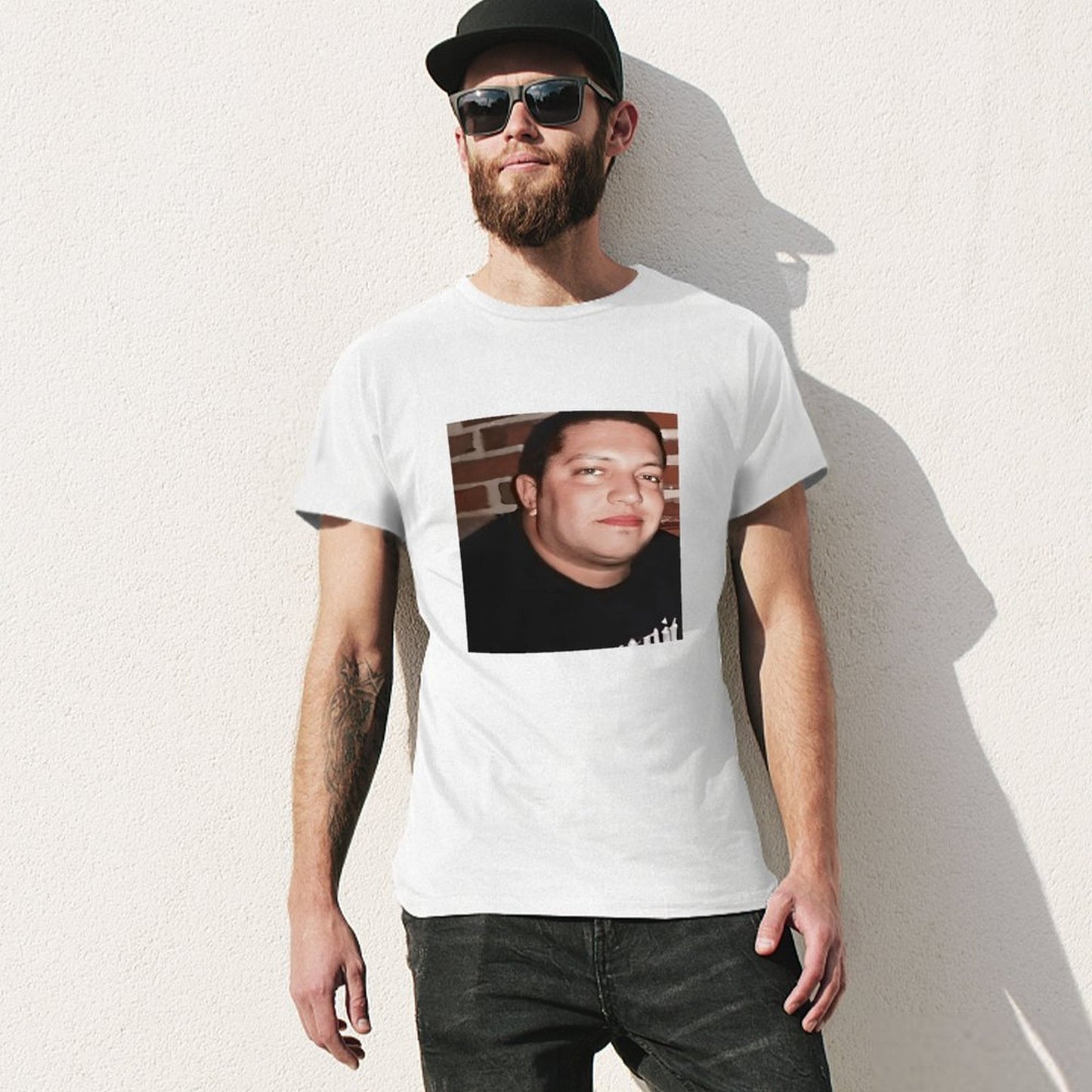 Inkmay Casual Cotton T-shirt Man Wears Black Shirt Against Brick Unisex T-shirtFresh On-Demand T-Shirt