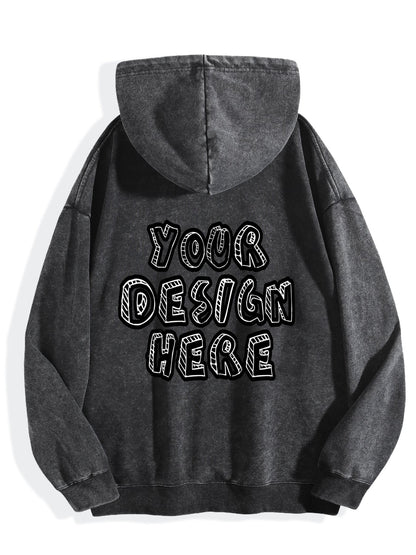 Custom-washed vintage-style black hoodie, back view.