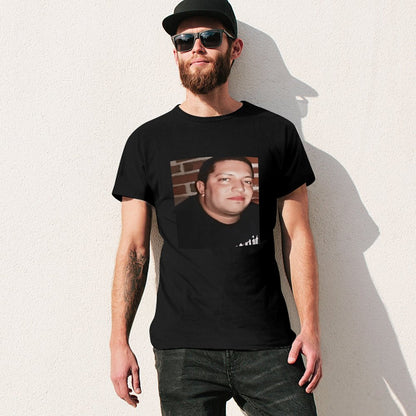 Inkmay Casual  Cotton T-shirt Man Wears Black Shirt Against Brick Unisex T-shirtFresh On-Demand T-Shirt